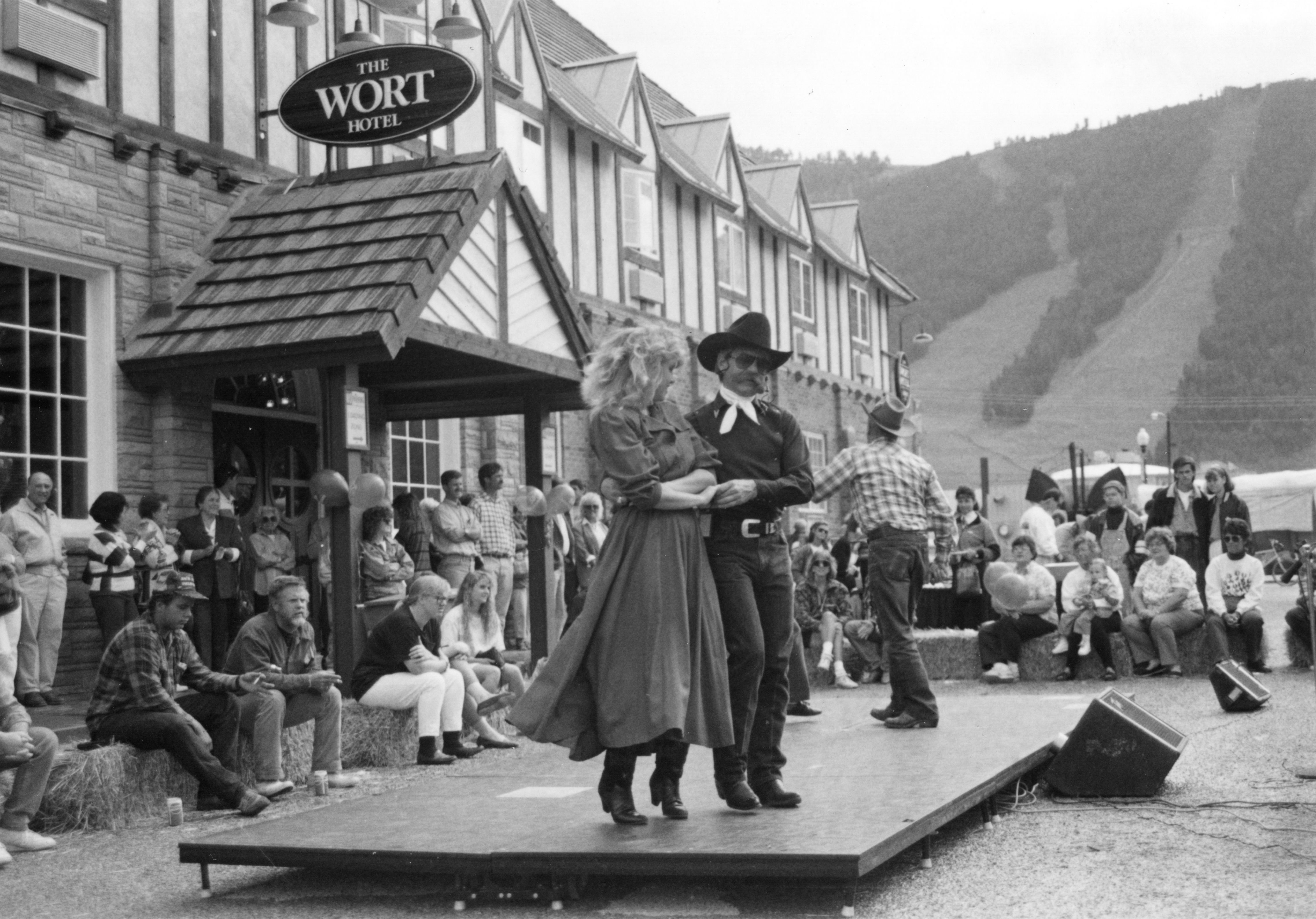 Historical image of a dance event in front of The Wort Hotel, a member of Historic Hotels of America since 2002, located in Jackson Hole, Wyoming